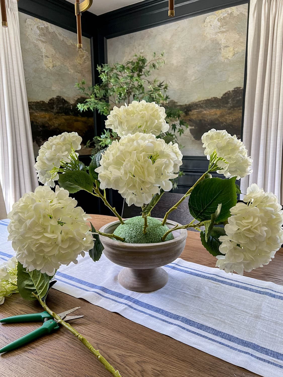 artificial flowers arranged in florist foam to make a DIY centerpiece