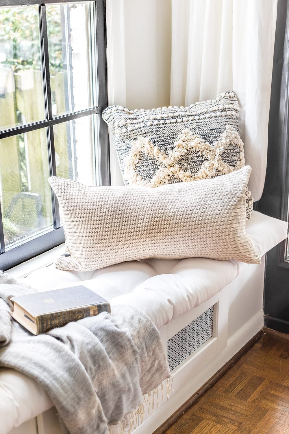 Simple Spring Home Tour | Neutral living room decorated with small floral touches for spring