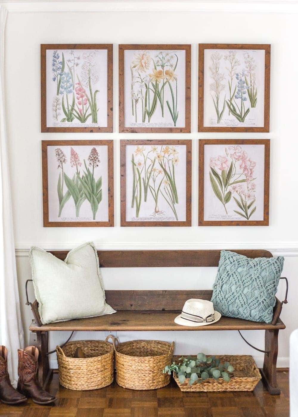 Simple Spring Home Tour | Craigslist bench with baskets underneath for a makeshift mud room and free botanical prints for spring.