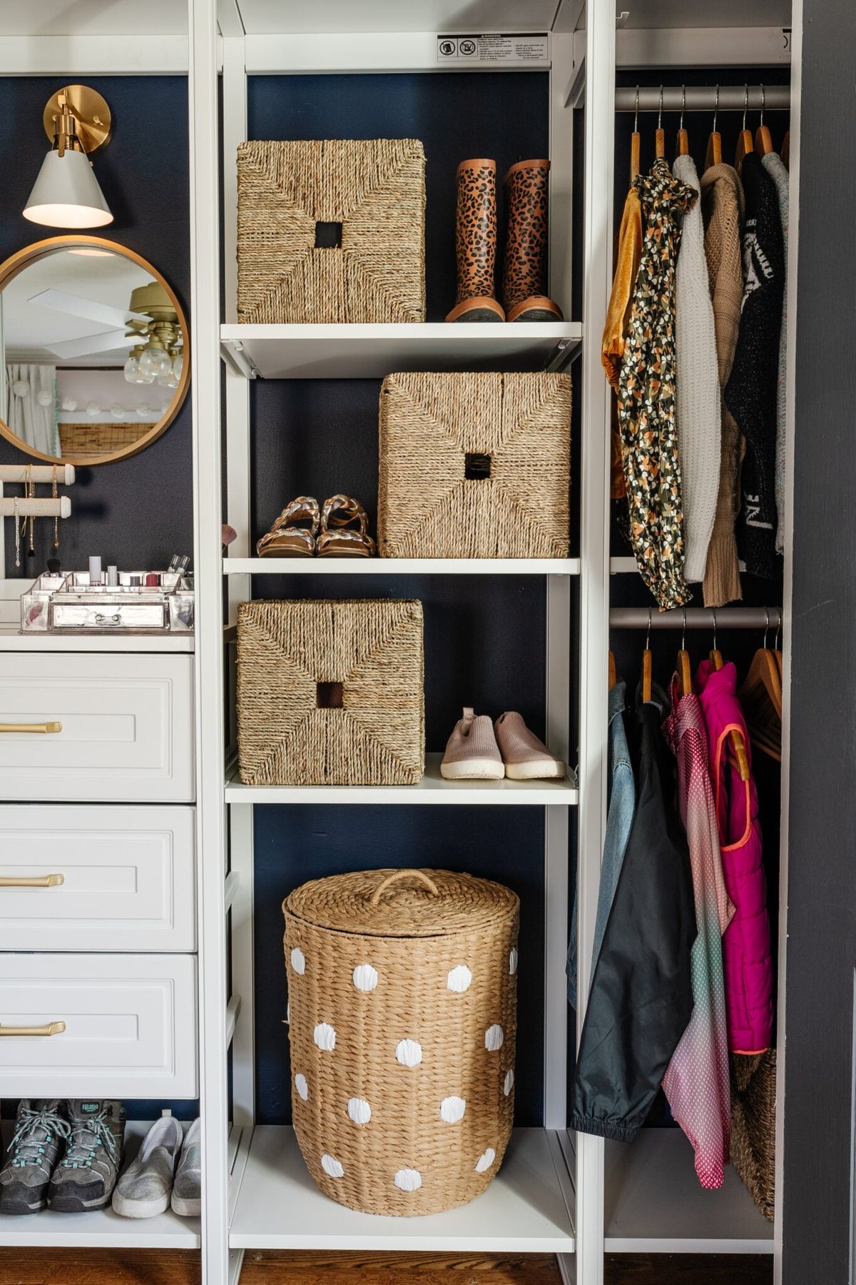 lidded hamper in a girls closet