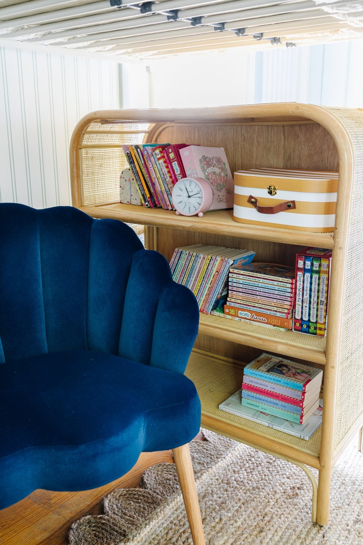 bookshelf under a bunk bed to make a hangout reading nook loft