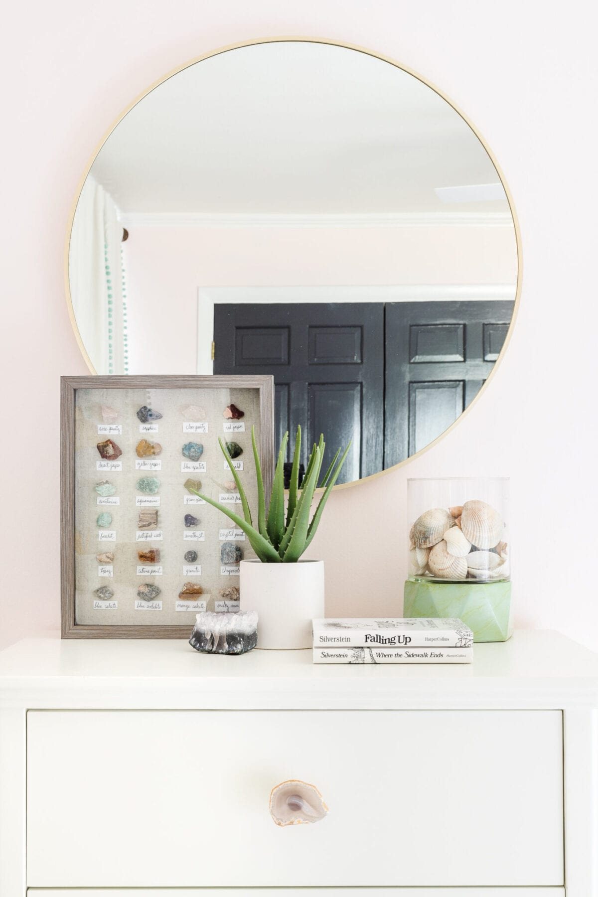 A little girl bedroom gets a big girl update using a few boho furniture swaps, DIY geology art, and glam accents.