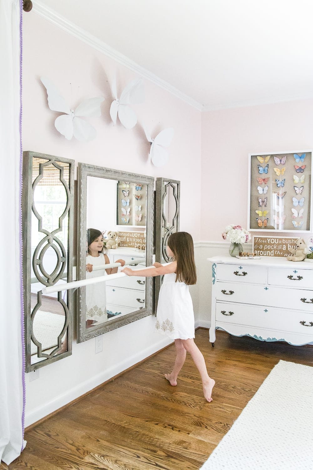A little girl bedroom gets a big girl update using a few boho furniture swaps, DIY geology art, and glam accents.