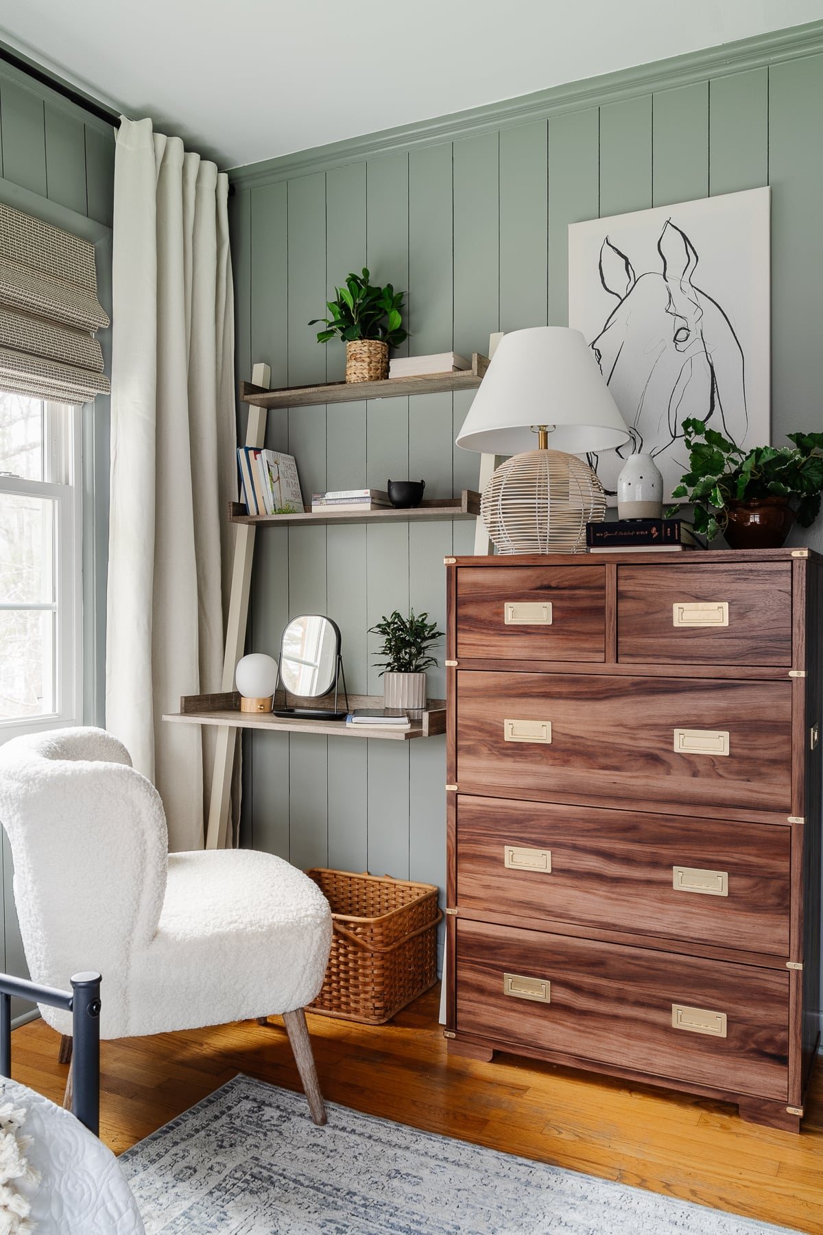 teen girl bedroom with vanity / desk and chair and dresser with horse art