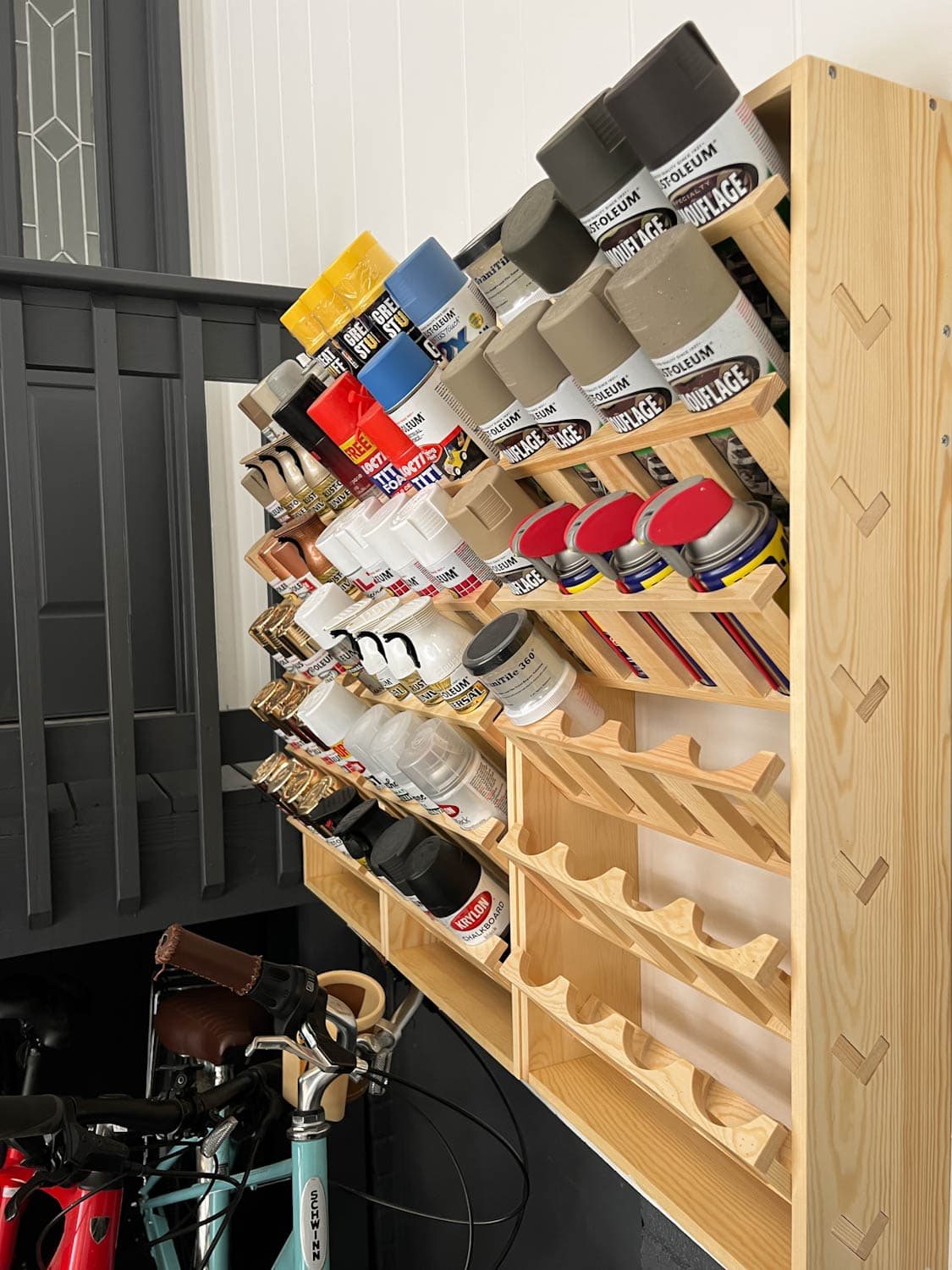 spray paint and caulking tube storage
