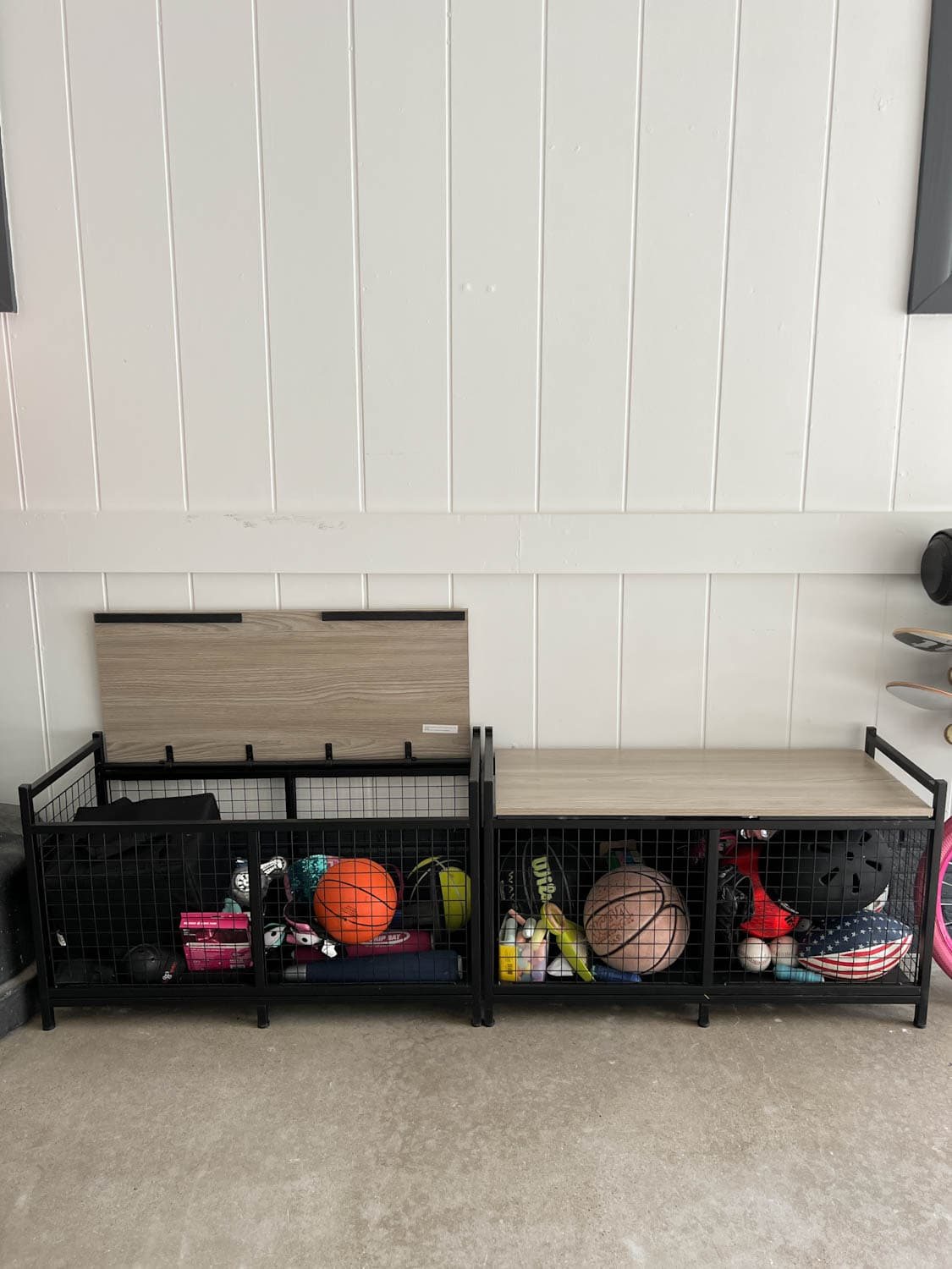 garage storage solution with heavy duty benches to store sporting equipment
