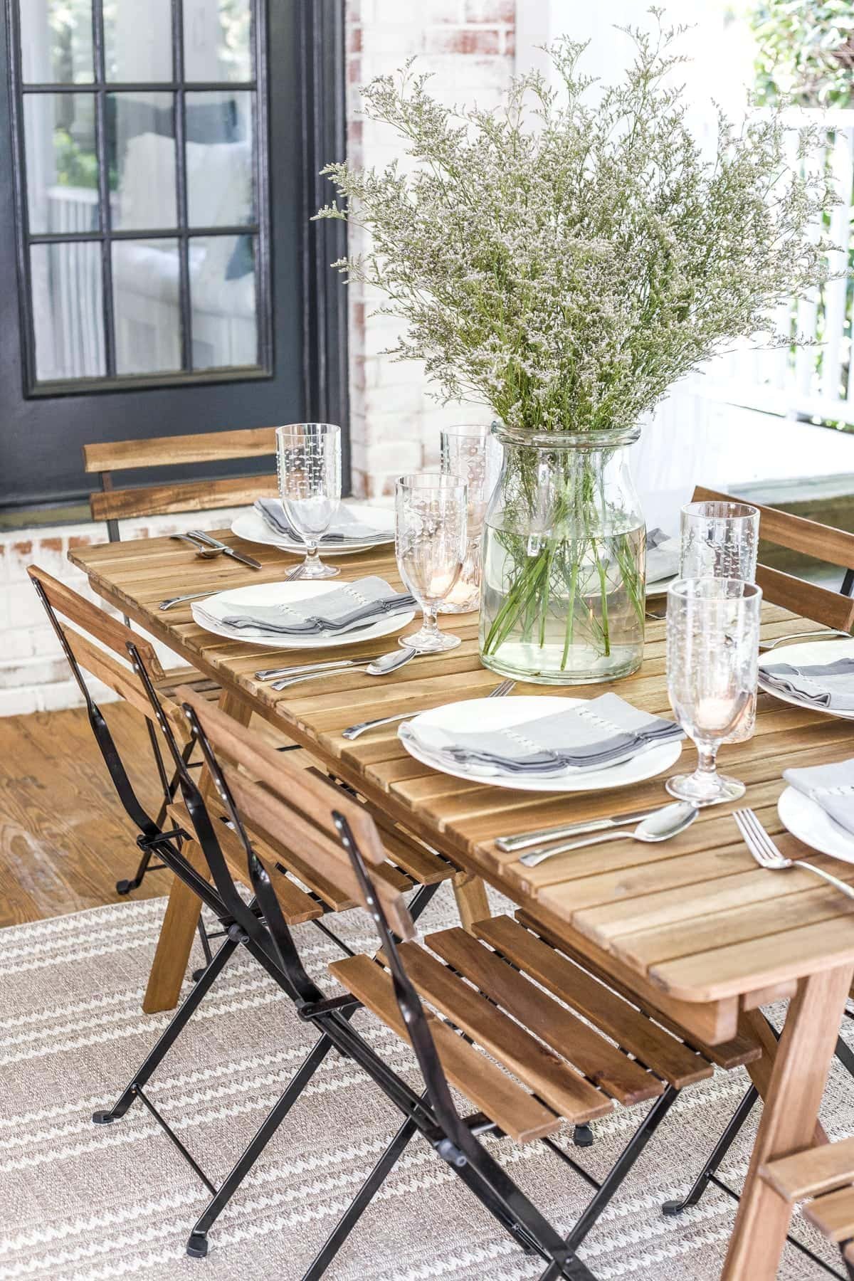 outdoor dining table on back porch