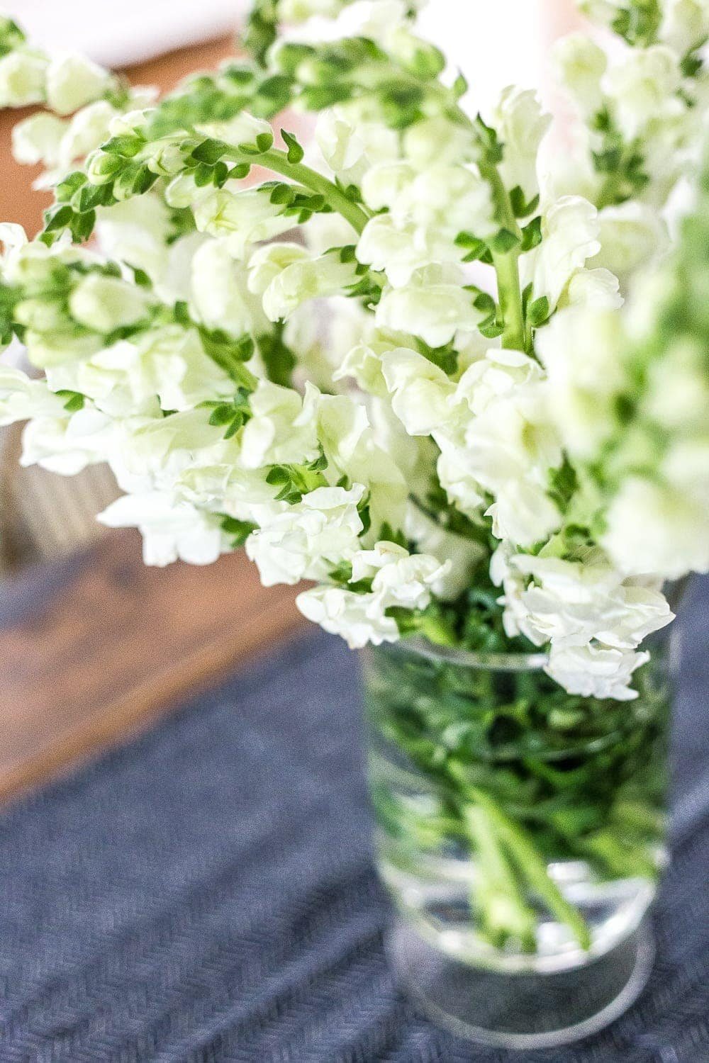 white summer flowers in a vase
