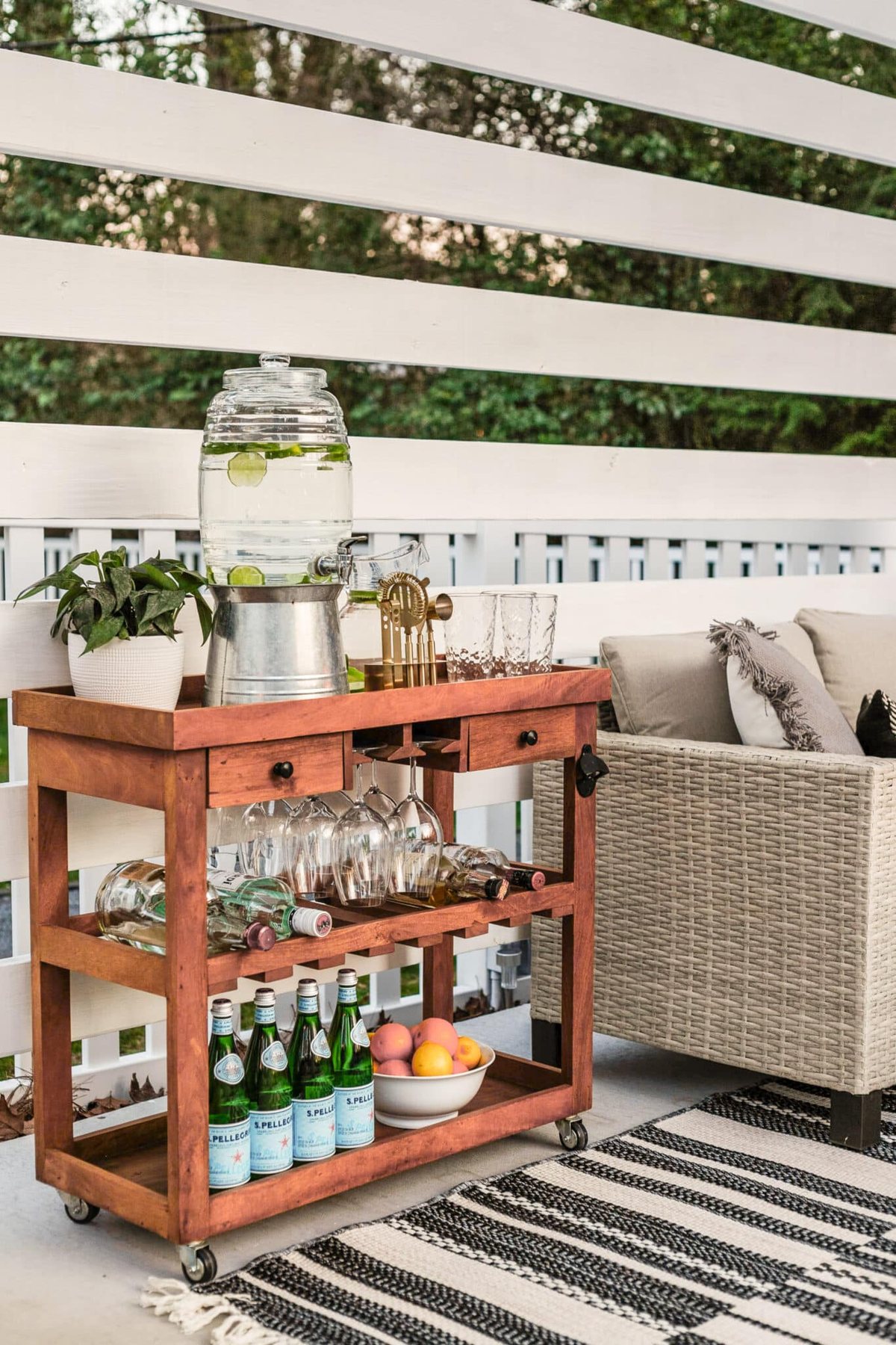 pool-friendly beverage station with acrylic cups and pitcher
