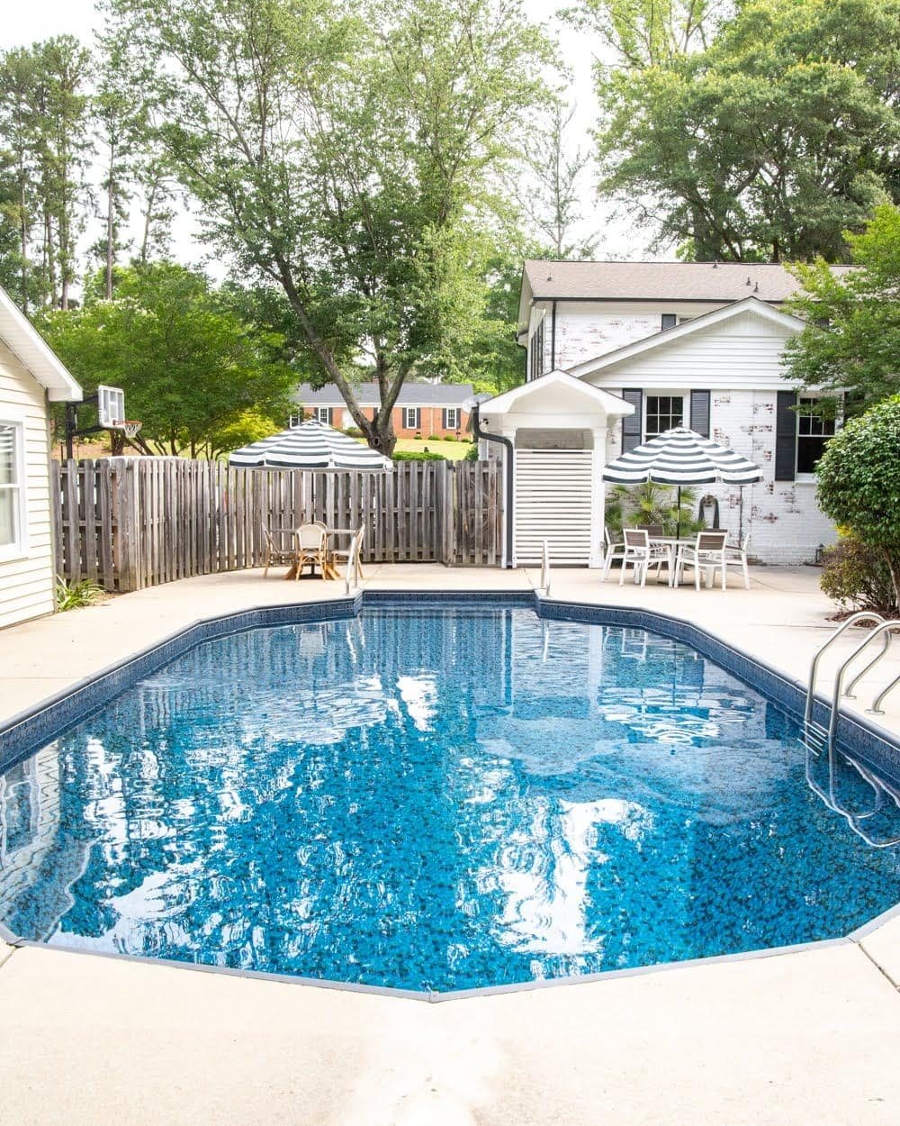 Swimming Pool Liner Makeover Reveal | Obsidian pool liner from GLI Pool Products TrueStone Collection and limewashed brick