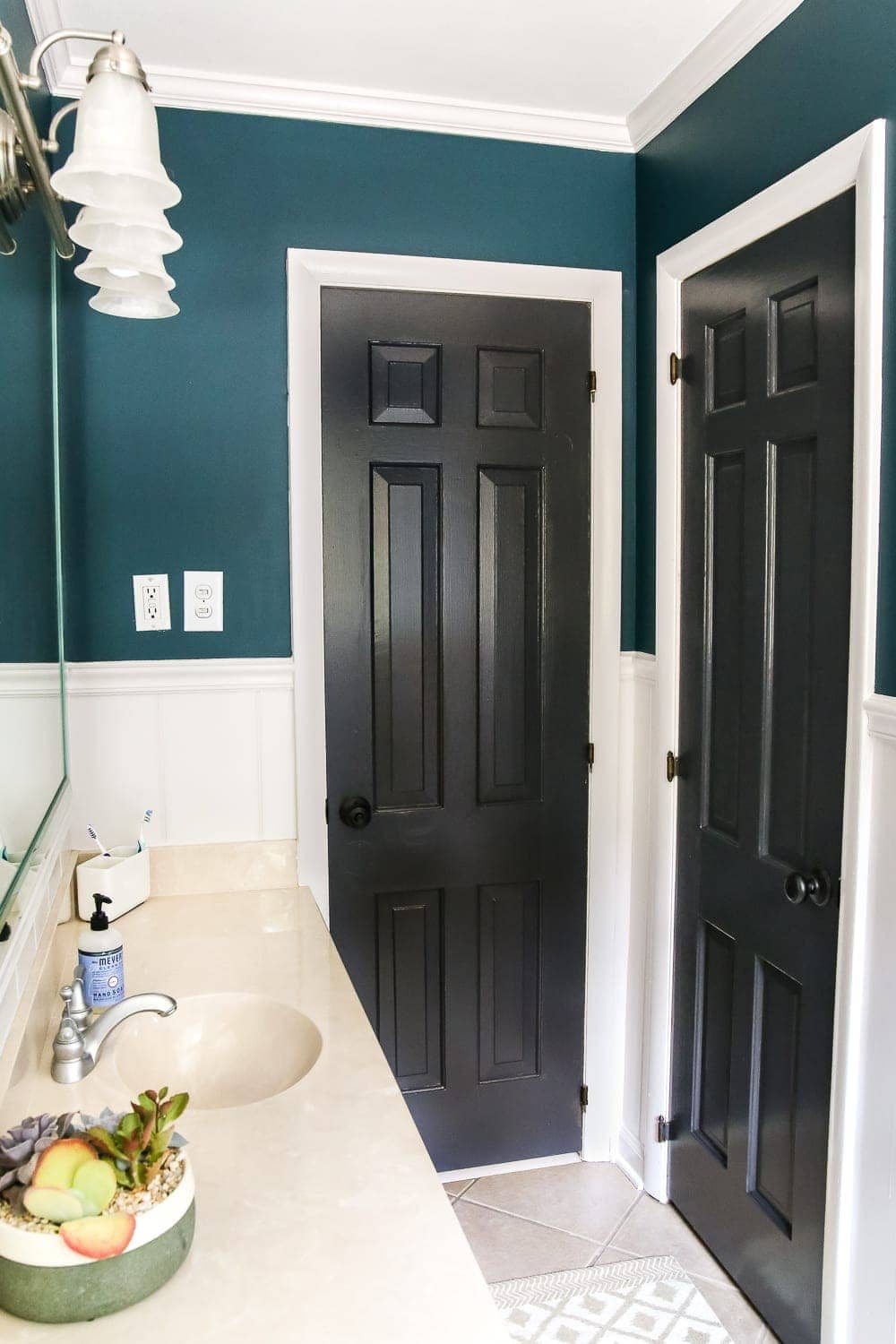 Teal Painted Bathroom Makeover | unigumushane.com - A boring, dated beige bathroom gets a fresh teal painted makeover with Magnolia Home Paint in the color Weekend and Ben Moore Simply White and Wrought Iron.
