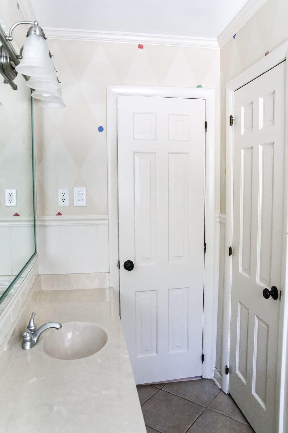 Teal Painted Bathroom Makeover | unigumushane.com - A boring, dated beige bathroom gets a fresh teal painted makeover with Magnolia Home Paint in the color Weekend and Ben Moore Simply White and Wrought Iron.