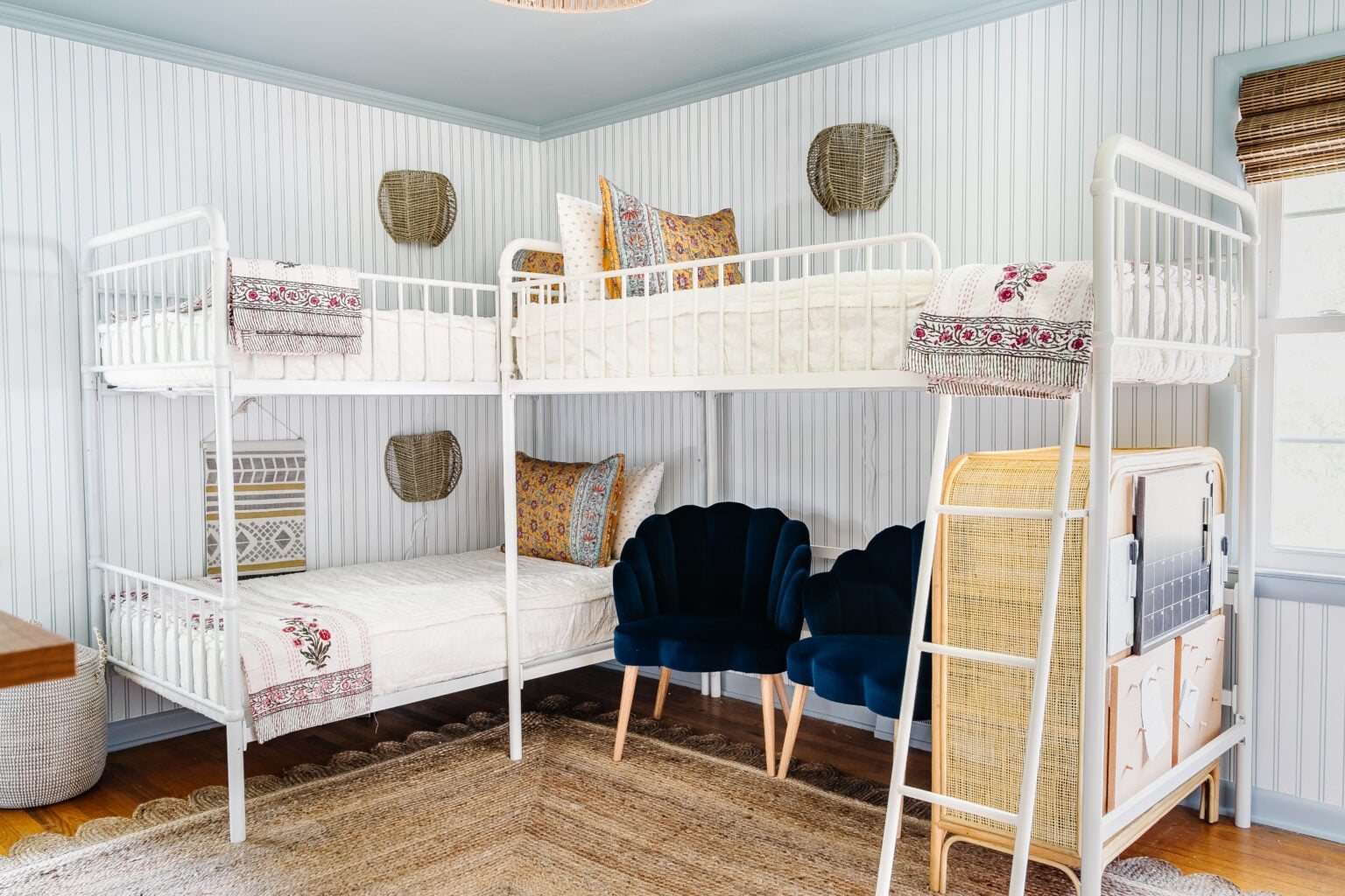 triple bunk bed in shared teenage bedroom with beach theme