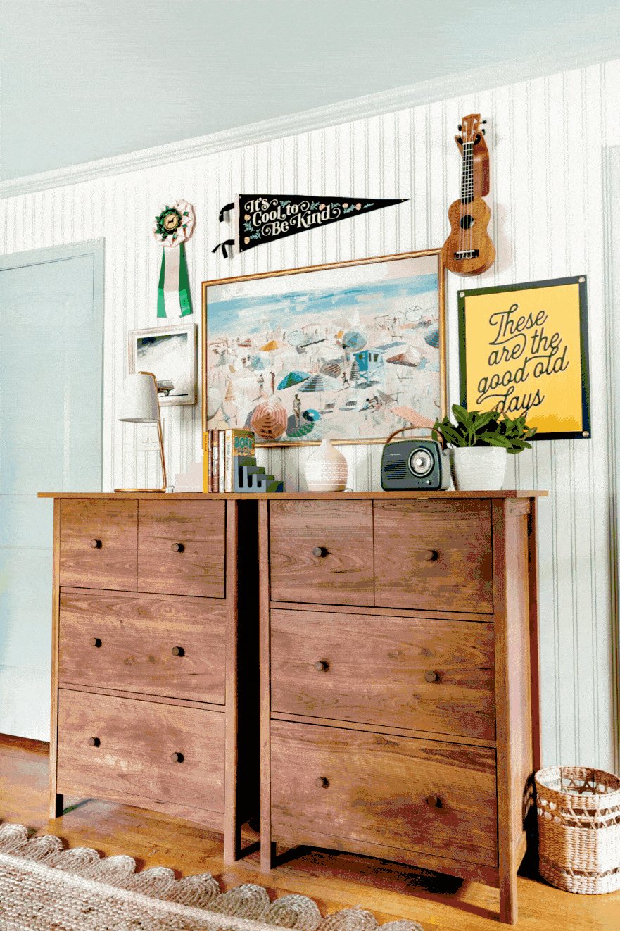 dresser desks in a shared teenage bedroom with camp art and coastal wall decor