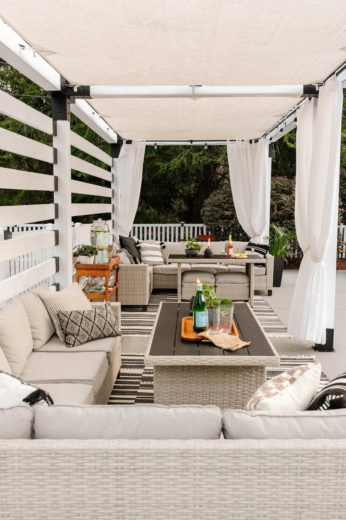 Walmart patio furniture in a DIY pool cabana
