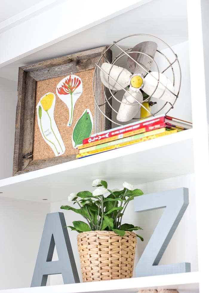 Eclectic Farmhouse Playroom Makeover | unigumushane.com - A boring and cluttered playroom gets a modern eclectic farmhouse makeover on a budget with DIY projects, smart storage solutions, and inexpensive finds. popular pin