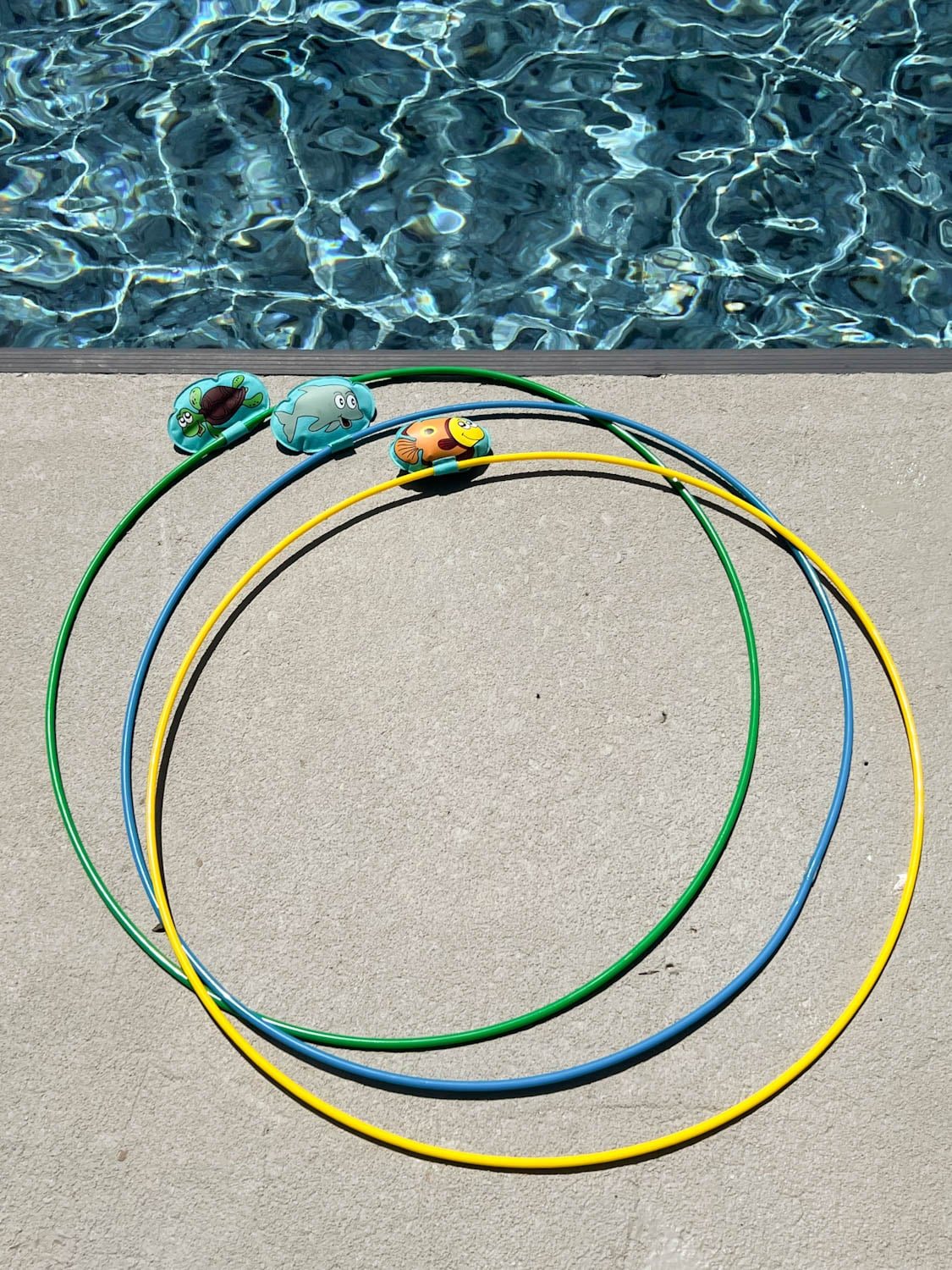 swim through rings on the side of a pool