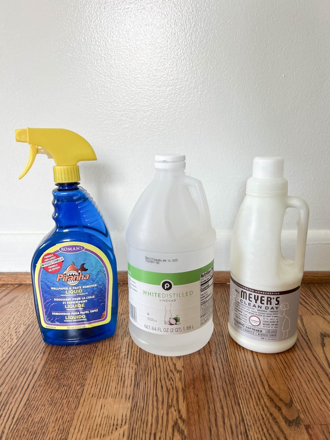 wallpaper remover solutions using store bought, vinegar, and fabric softener