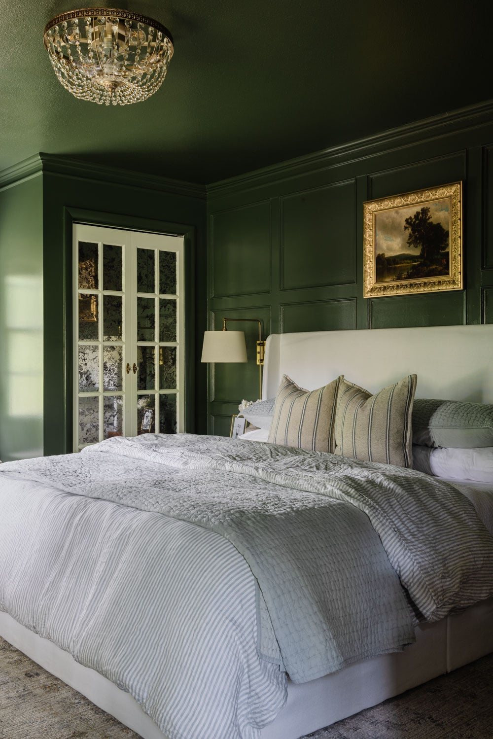 the viral fandelier in a green bedroom