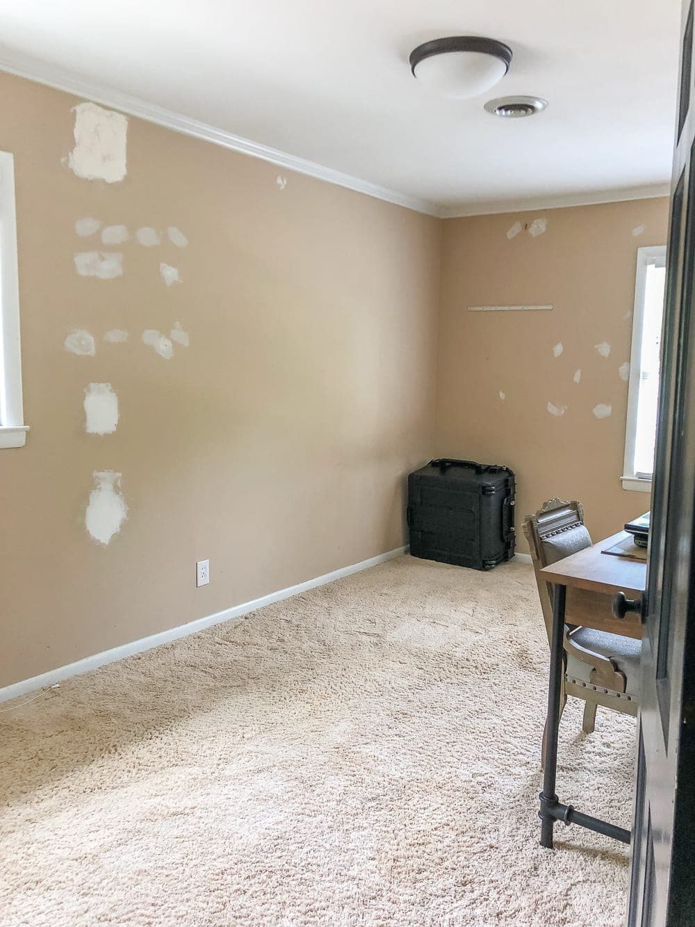 A boring guest bedroom gets a luxe, vintage chic makeover using thrifty projects, budget finds, and simple decorating tricks to maximize style and space. #guestbedroom #bedroominspiration #bedroomdecor