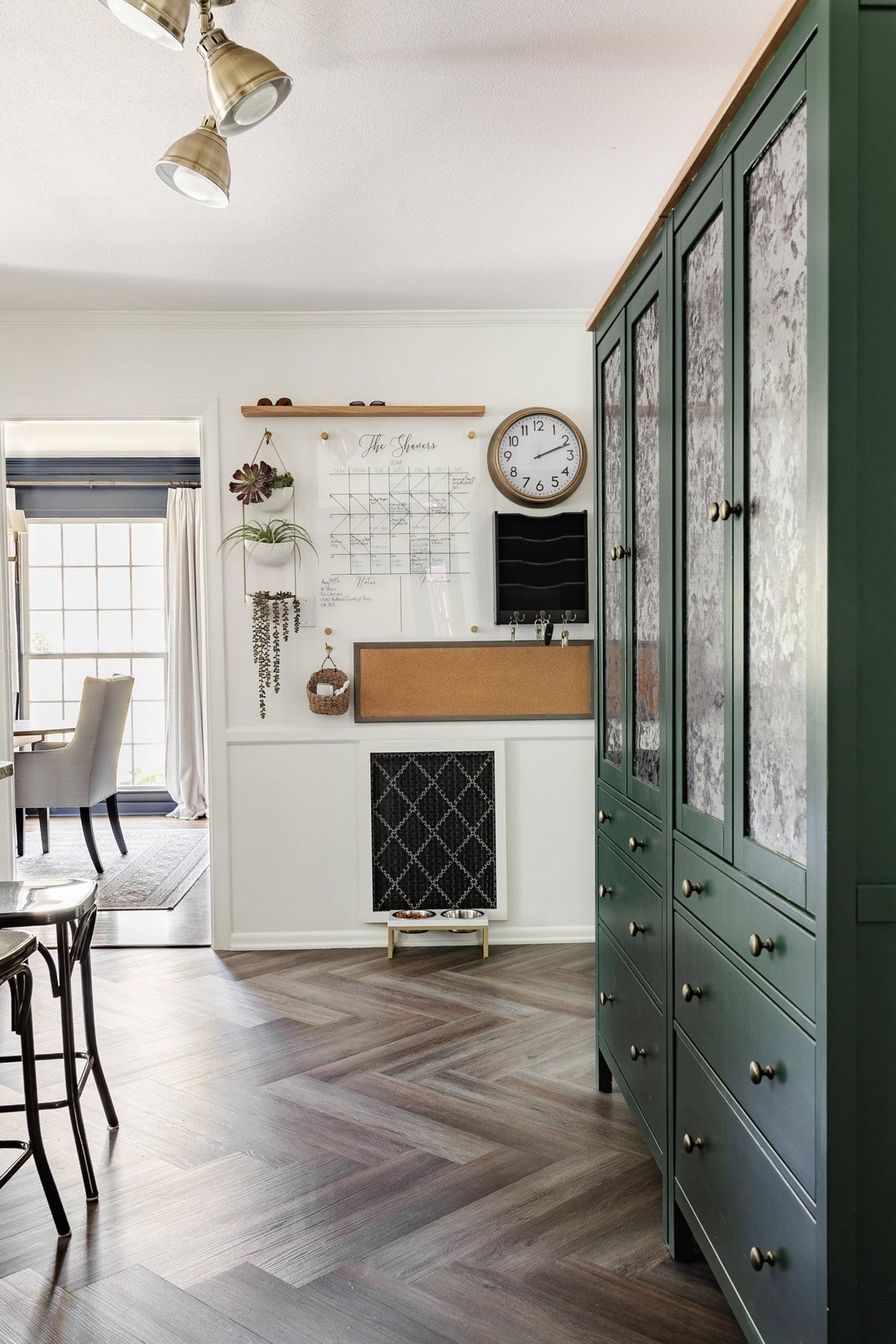 command center wall with mail drop zone in kitchen