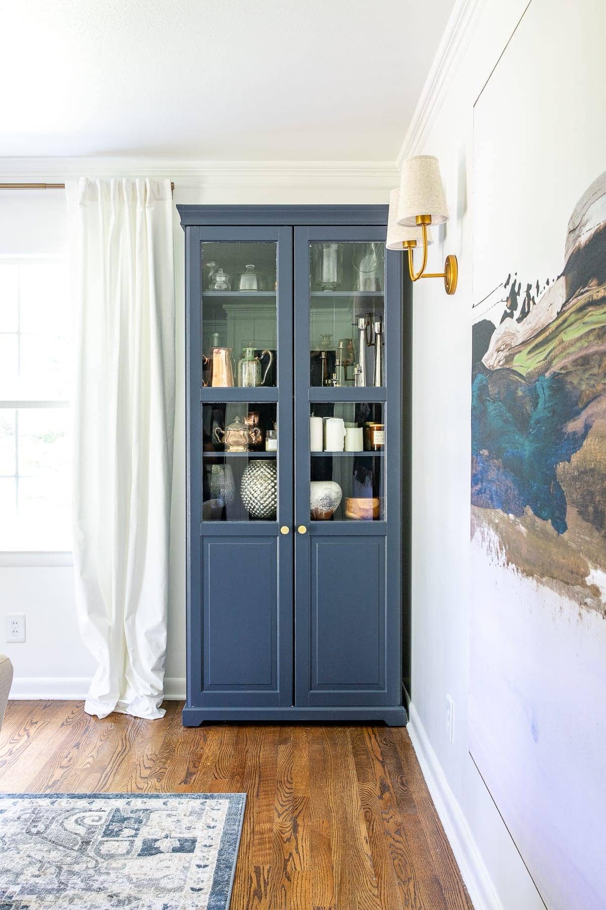 office cabinet with craft supplies and home decor