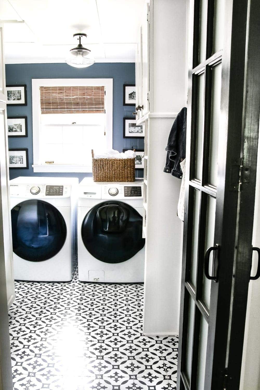 High Contrast Laundry Room Makeover | unigumushane.com - A dingy and dated laundry room gets a high contrast navy and white makeover packed with organizational strategies and budget-conscious DIY projects.