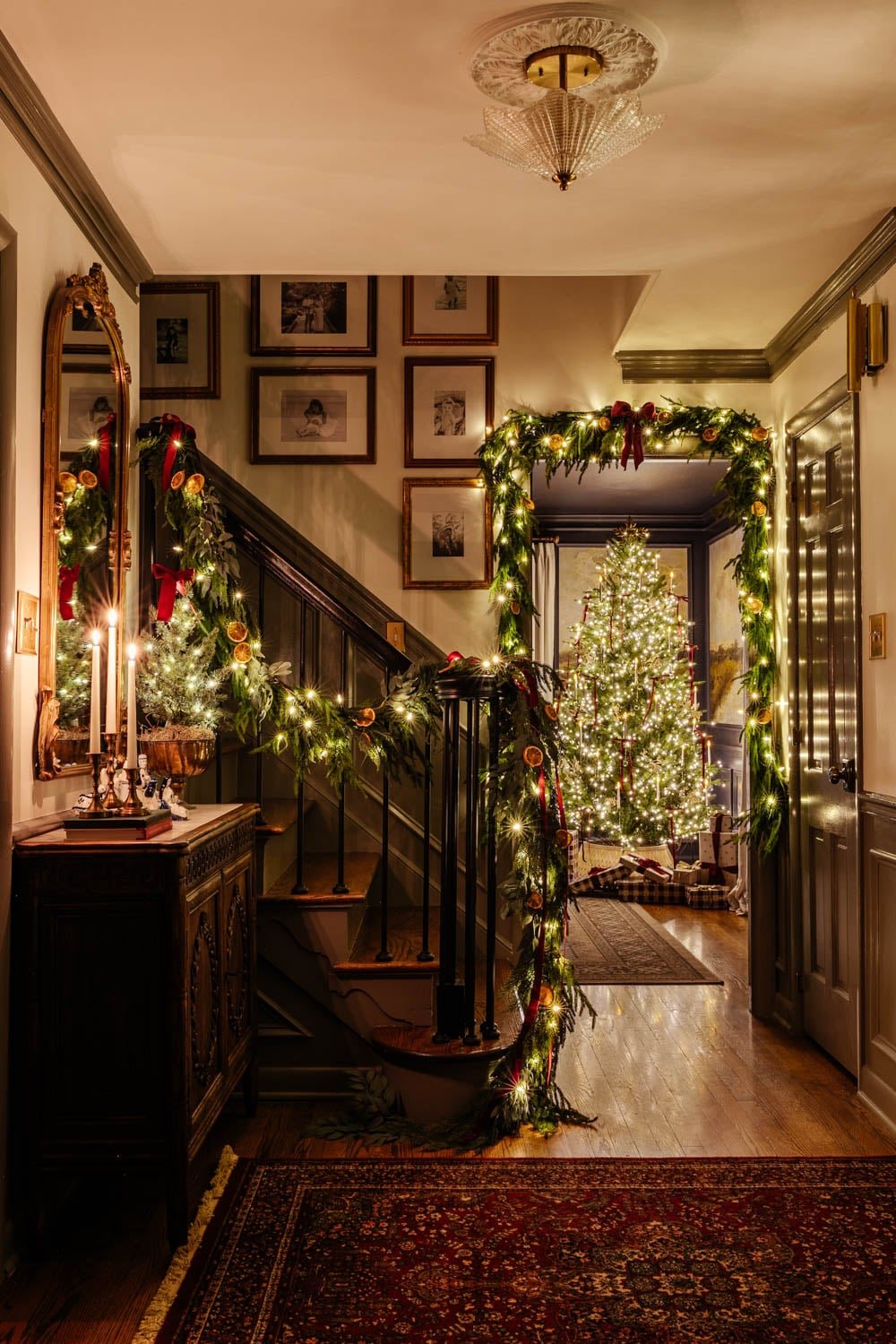 modern traditional candlelight Christmas entryway