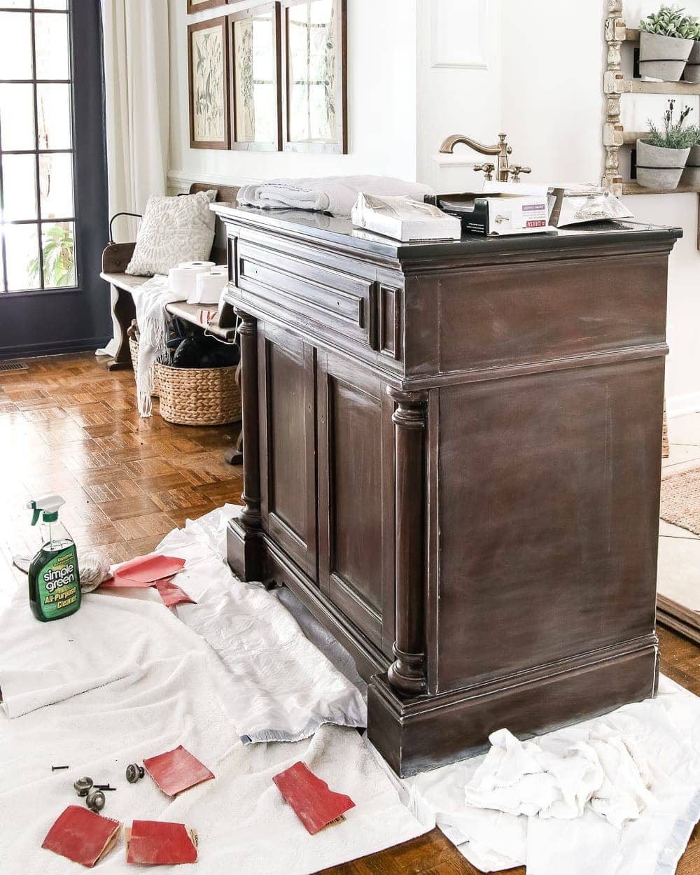 Weathered Gray Wood Look Vanity Makeover | unigumushane.com - A vanity gets a weathered gray wood look using just chalk paint and wax. Looks so much like real weathered wood in less time with less mess!