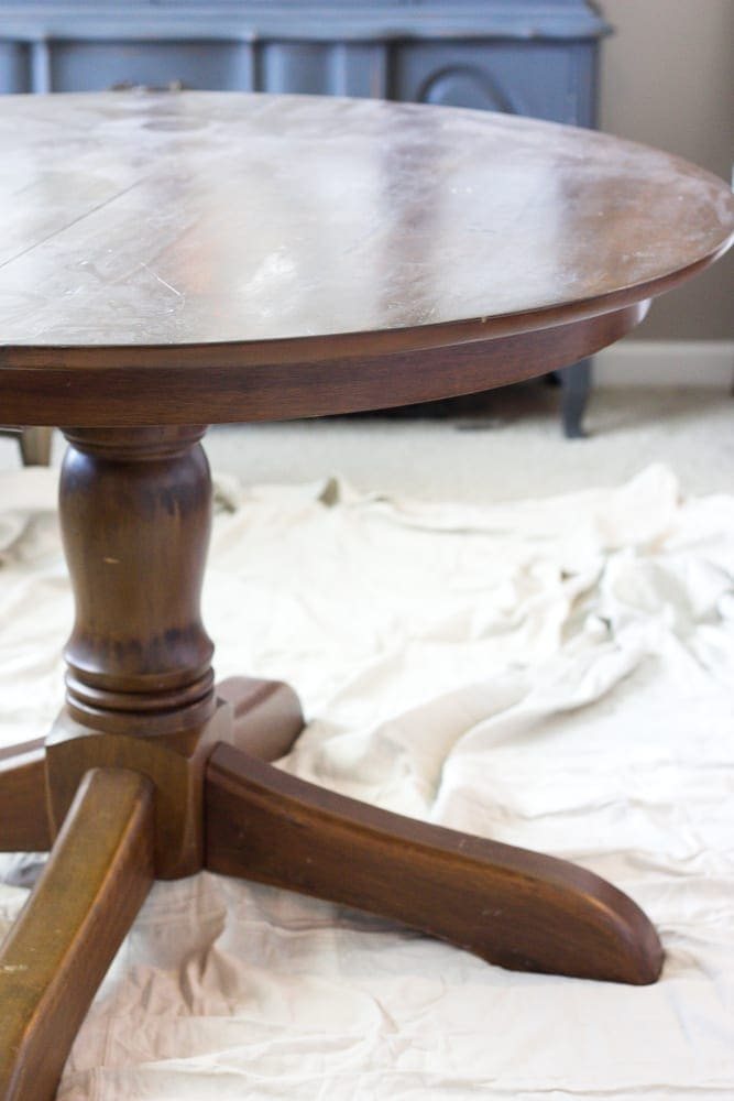 Weathered Oak Dining Table Makeover | unigumushane.com - A thrifted banged up dining table gets a simple weathered oak finish for a high-end designer look. This tutorial is so easy!