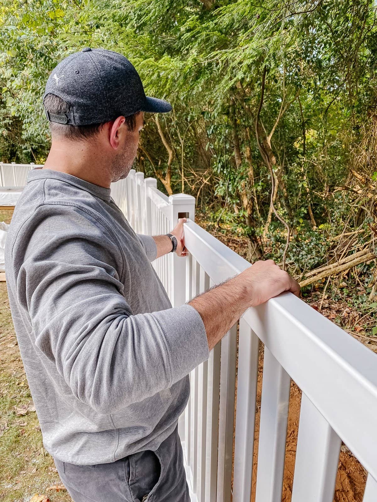 white vinyl fence installation using Ply Gem
