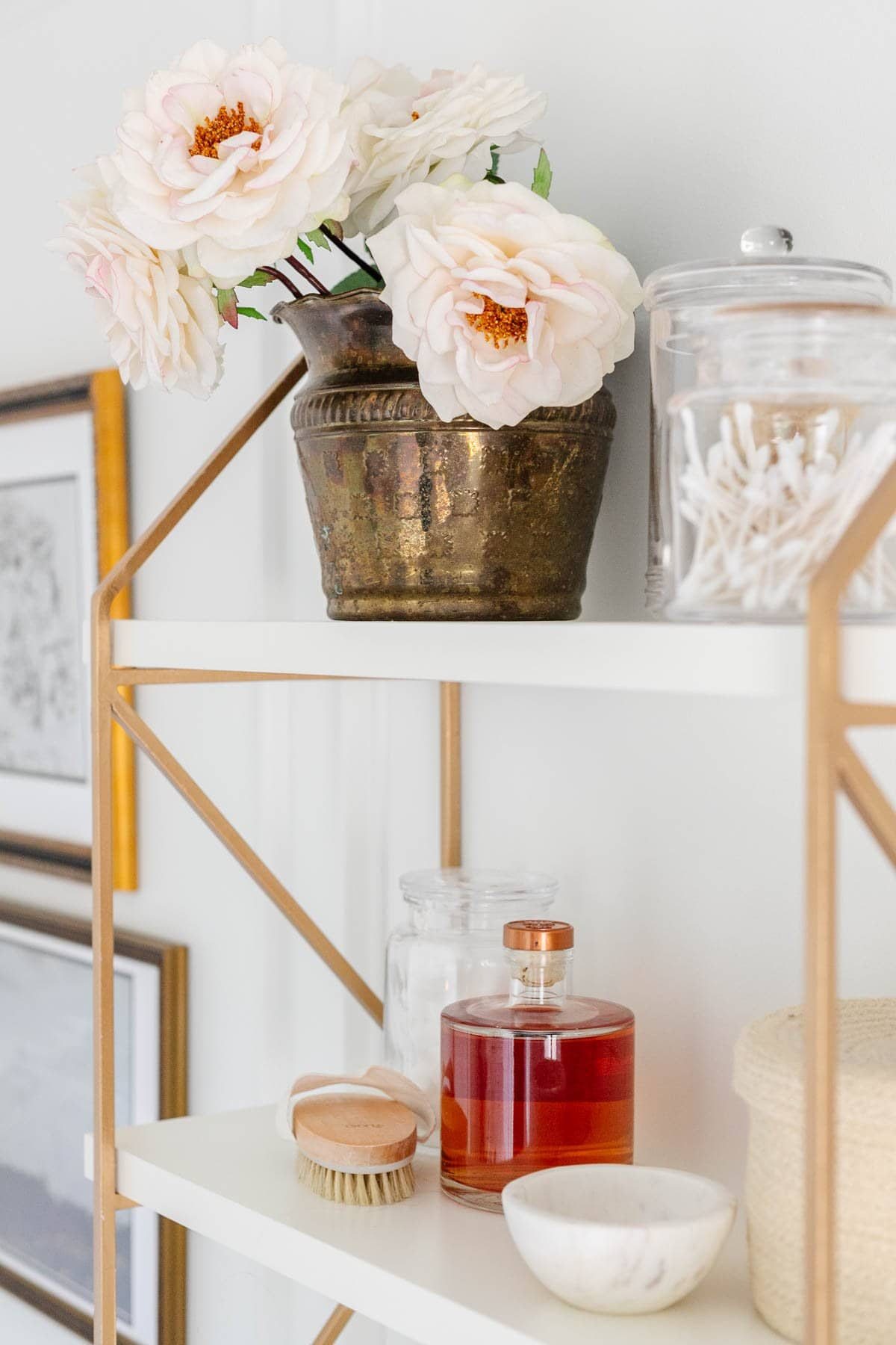 bathroom shelves organized with jars