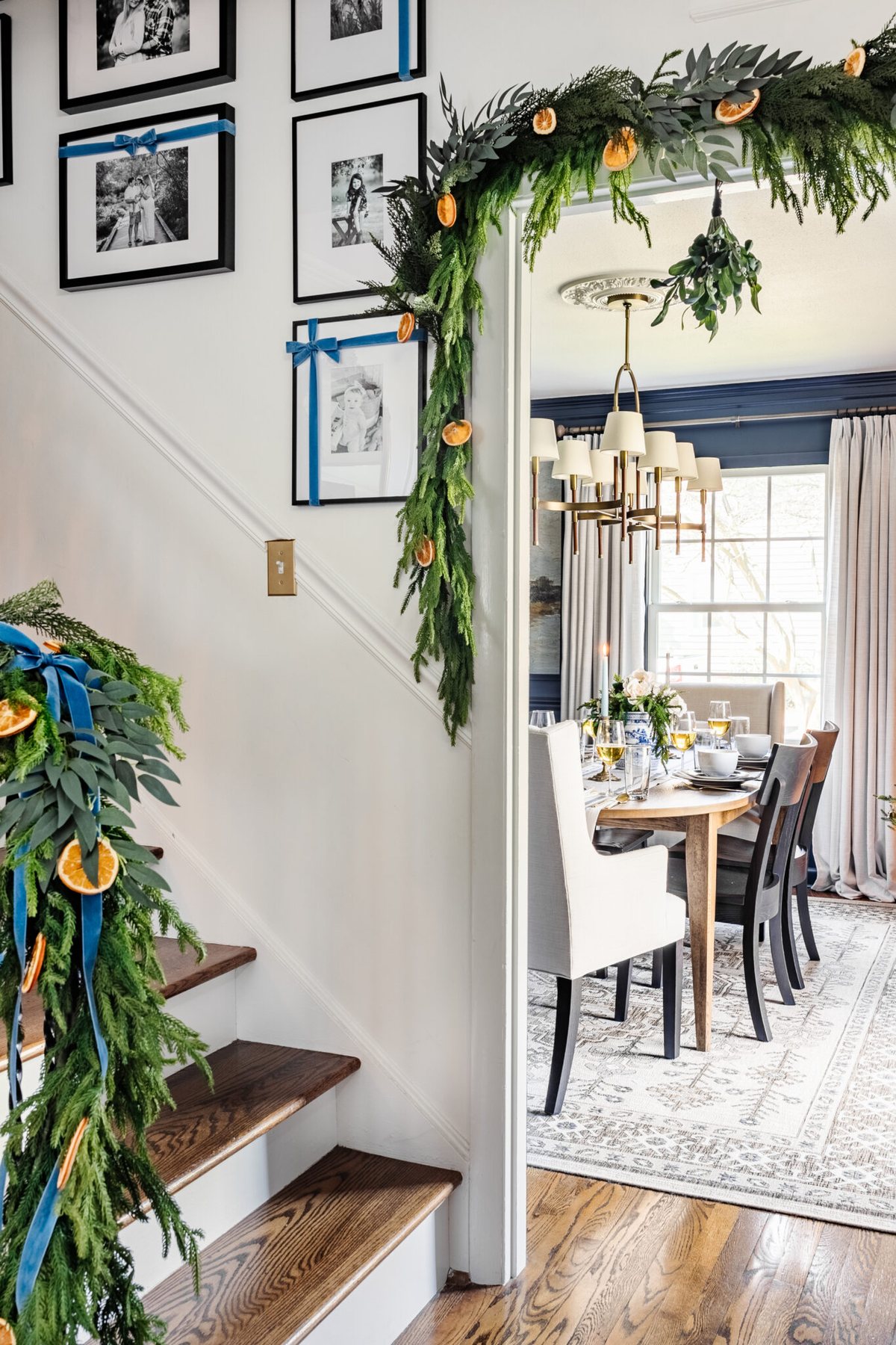 peek of dining room with garland framing doorway