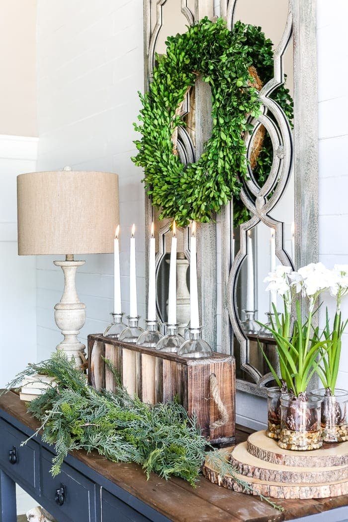 6 After-Christmas Winter Foyer Decorating Ideas | unigumushane.com - 6 tips for decorating a winter foyer or entryway after Christmas to create warm lighting and natural elements for a cozy, inviting space