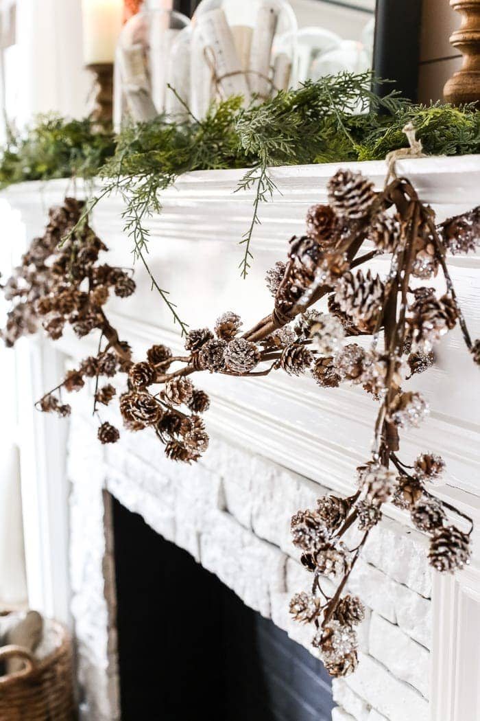 After-Christmas Winter Mantel and Living Room | unigumushane.com - A tour of an after-Christmas winter mantel and living room with thrifty ideas and creative budget decor to help bring warmth and life to your home.