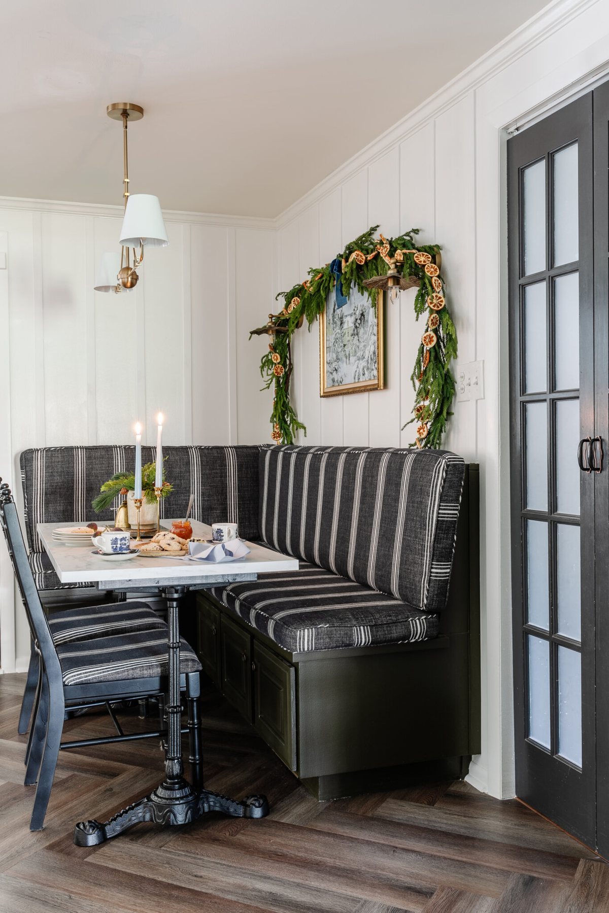 breakfast nook banquette and table with Christmas decor