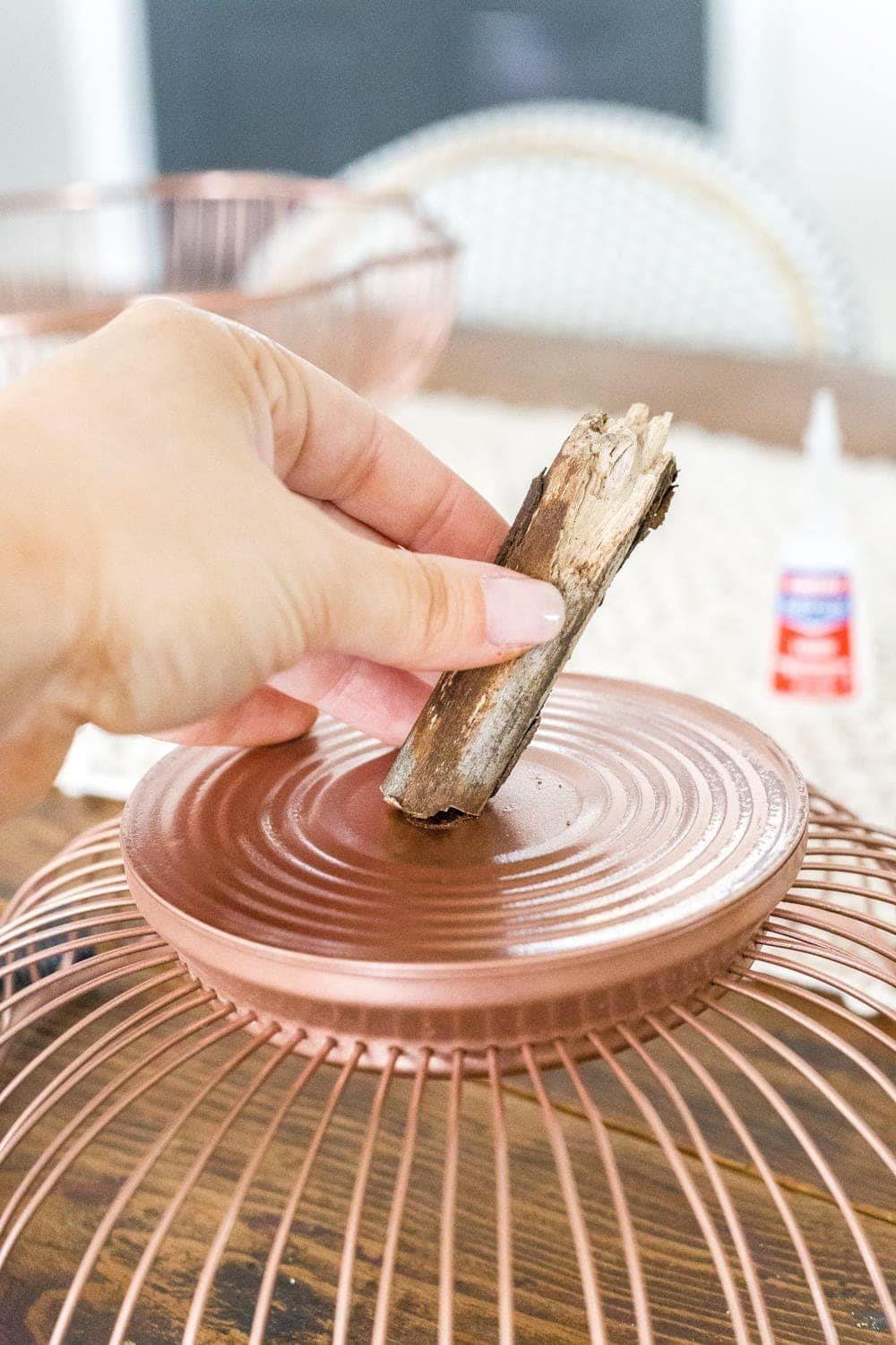 DIY pumpkin using wire bread baskets and sticks from your yard