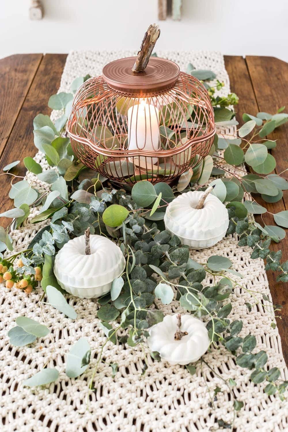 DIY pumpkin lantern using thrifted wire bread baskets and craft pumpkins using mini bundt pan Jello molds
