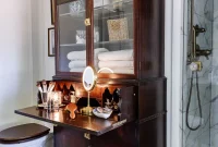 Turn a Secretary Desk Into a Makeup Vanity for Small Bathrooms