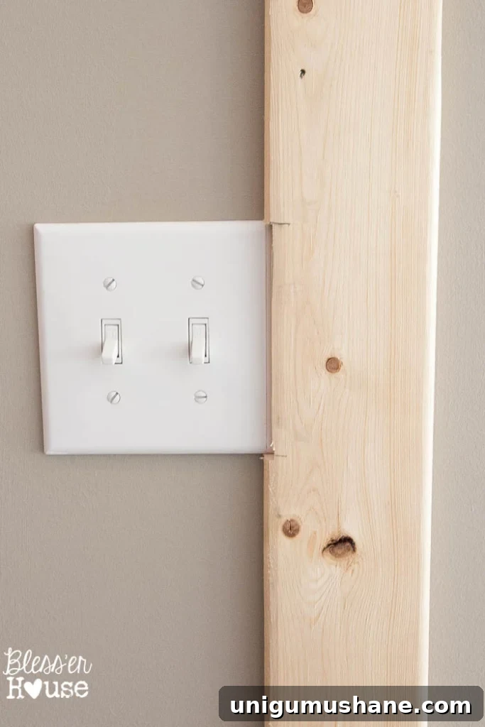 Affordable DIY Board and Batten: Step-by-Step Wall Tutorial 16 notch out light switches with a jigsaw