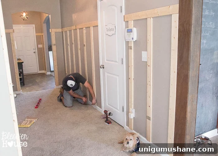 Affordable DIY Board and Batten: Step-by-Step Wall Tutorial 18 nailing battens to wall