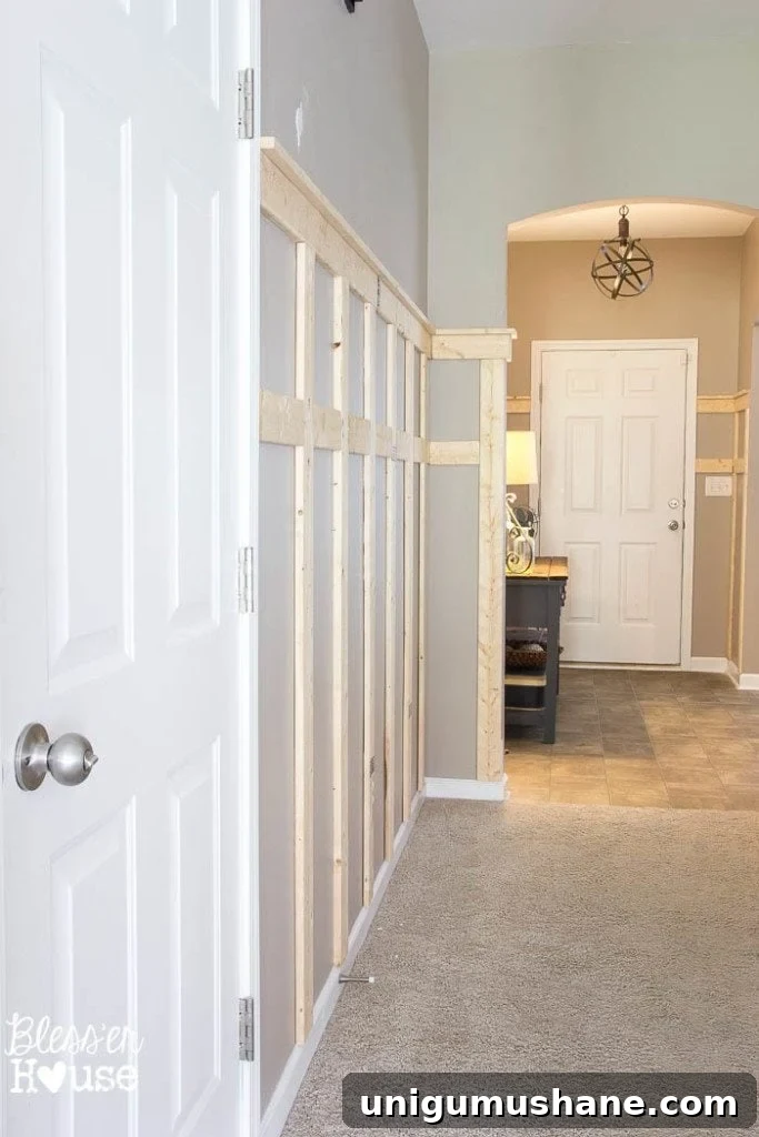 Affordable DIY Board and Batten: Step-by-Step Wall Tutorial 21 board and batten before caulking