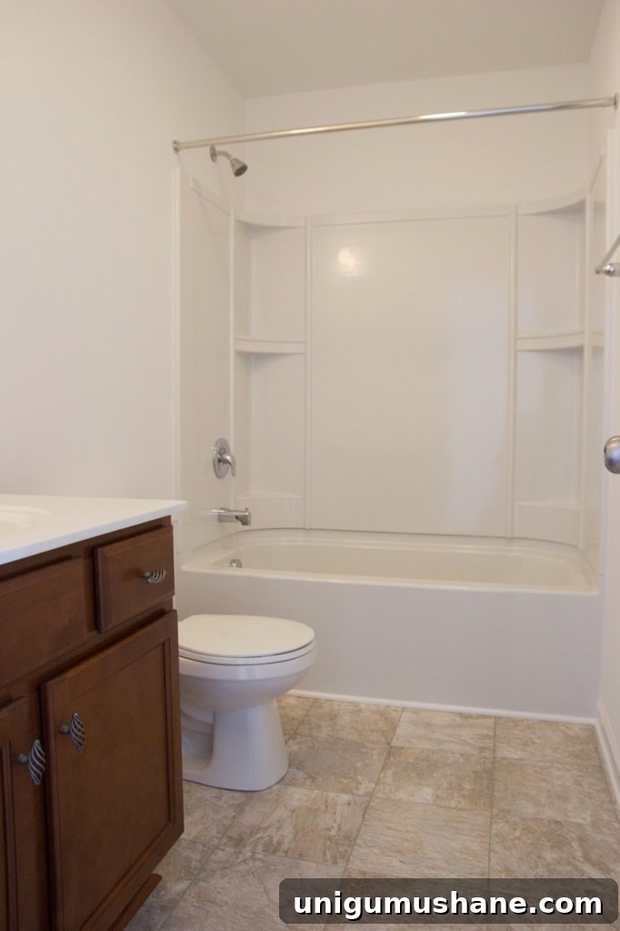 Modern Farmhouse Bathroom Remodel Reveal: Before and After 3 Modern Farmhouse Bathroom Makeover | Bless'er House - So many great ideas to create charm in a builder grade bathroom!