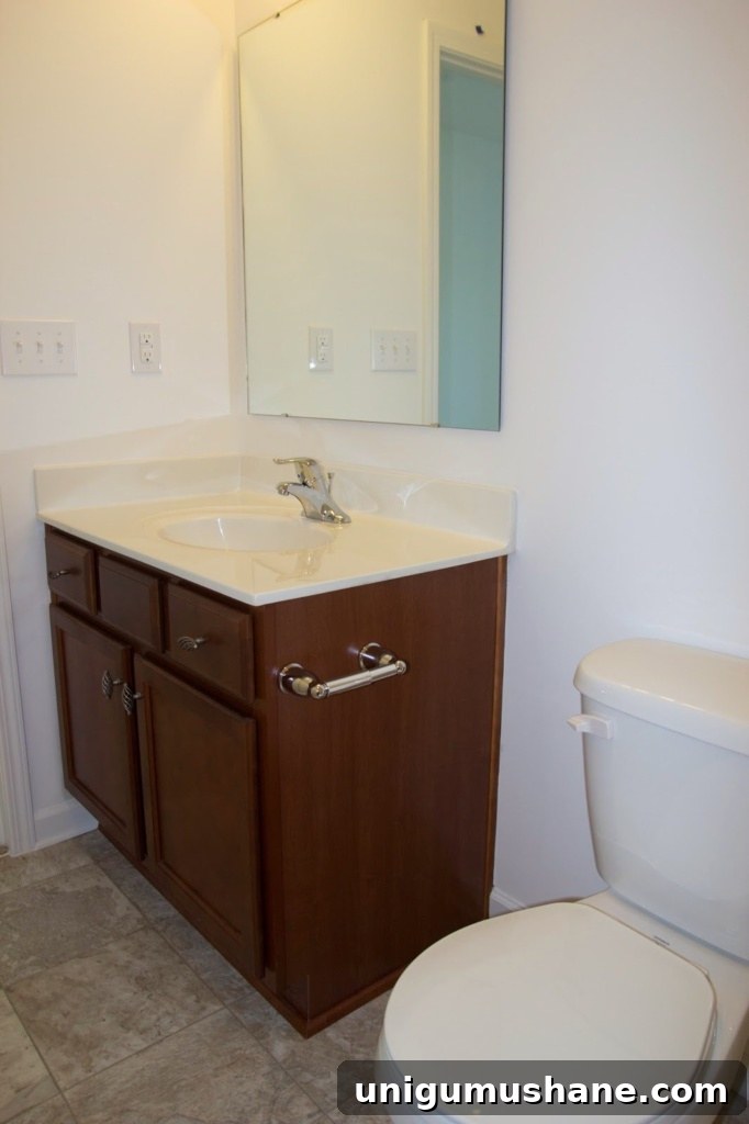 Modern Farmhouse Bathroom Remodel Reveal: Before and After 4 Modern Farmhouse Bathroom Makeover | Bless'er House - So many great ideas to create charm in a builder grade bathroom!