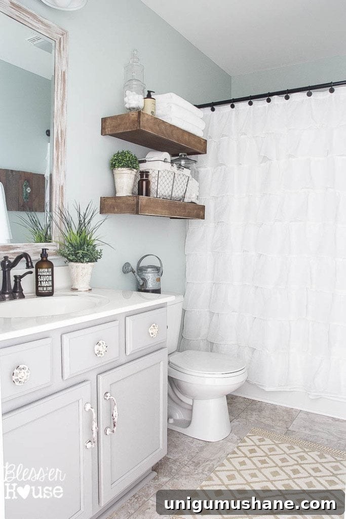 Modern Farmhouse Bathroom Remodel Reveal: Before and After 5 Modern Farmhouse Bathroom Makeover | Bless'er House - So many great ideas to create charm in a builder grade bathroom!