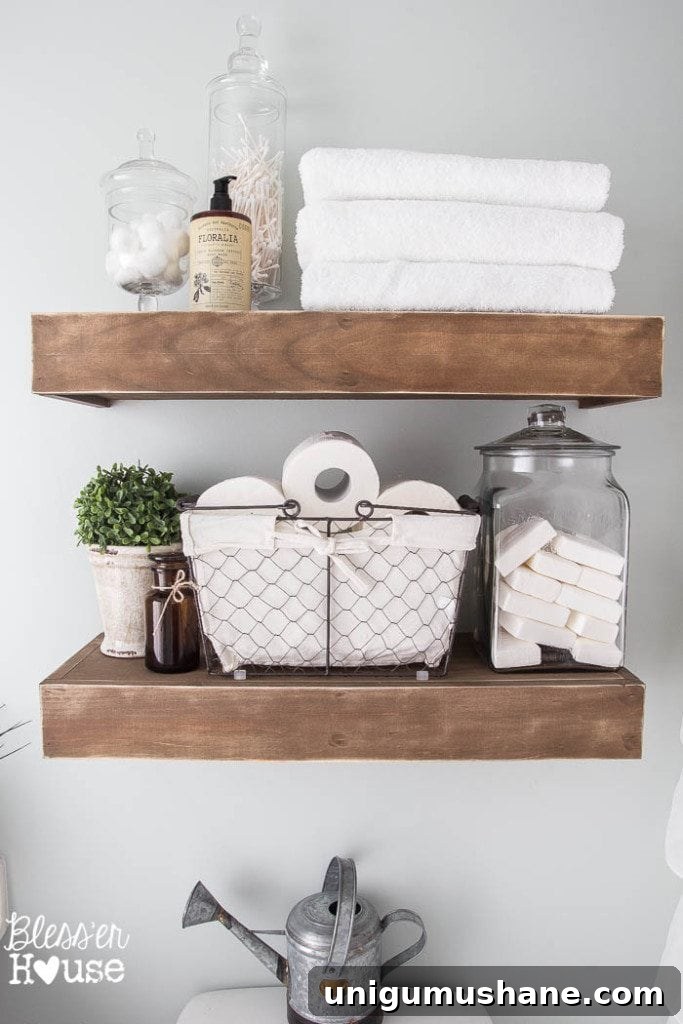 Modern Farmhouse Bathroom Remodel Reveal: Before and After 7 Modern Farmhouse Bathroom Makeover | Bless'er House - So many great ideas to create charm in a builder grade bathroom!