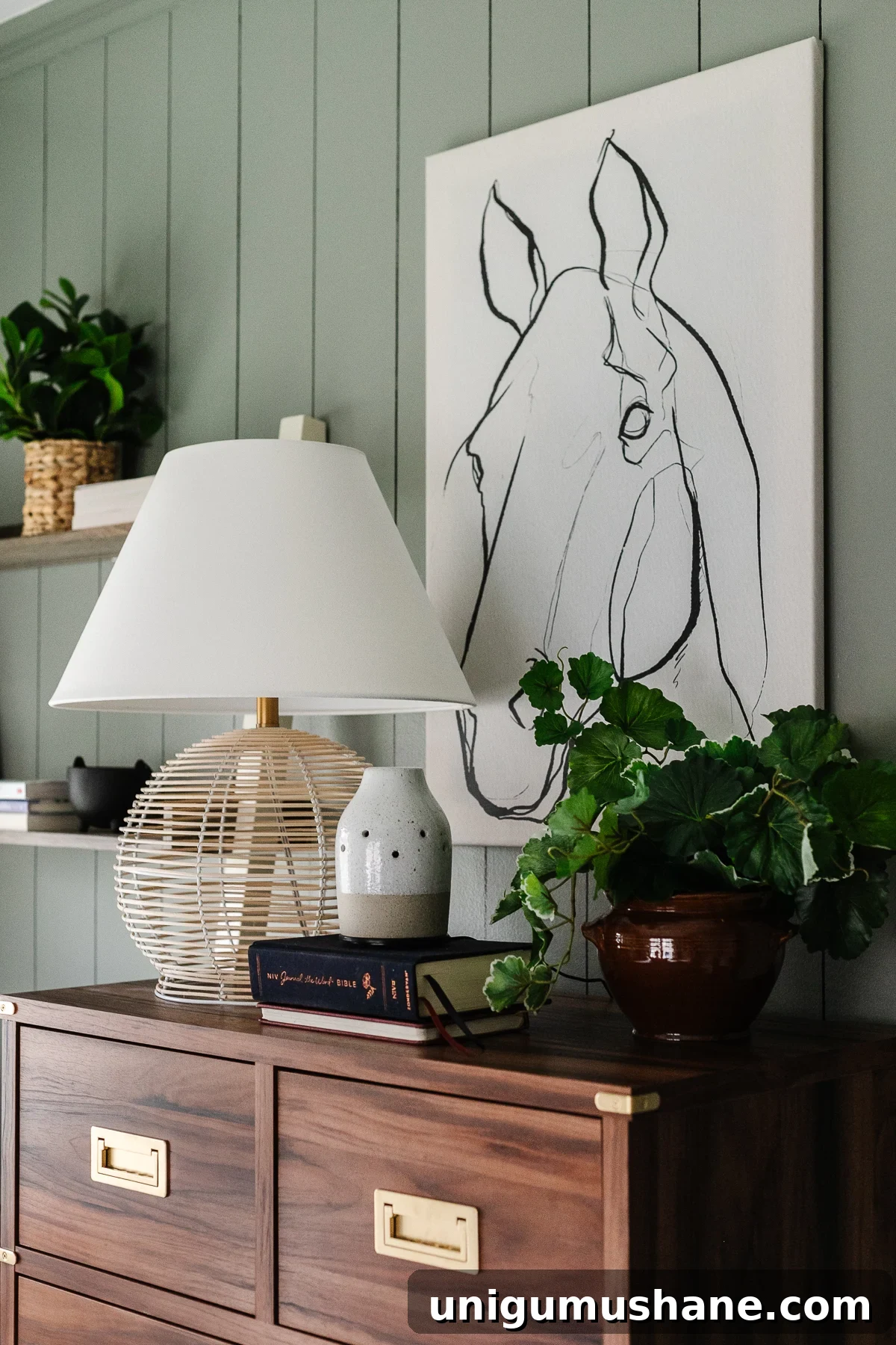 Where to Buy Furniture and Kitchen Cabinet Hardware 17 wooden dresser in bedroom with horse drawing, rattan lamp, and plant on top