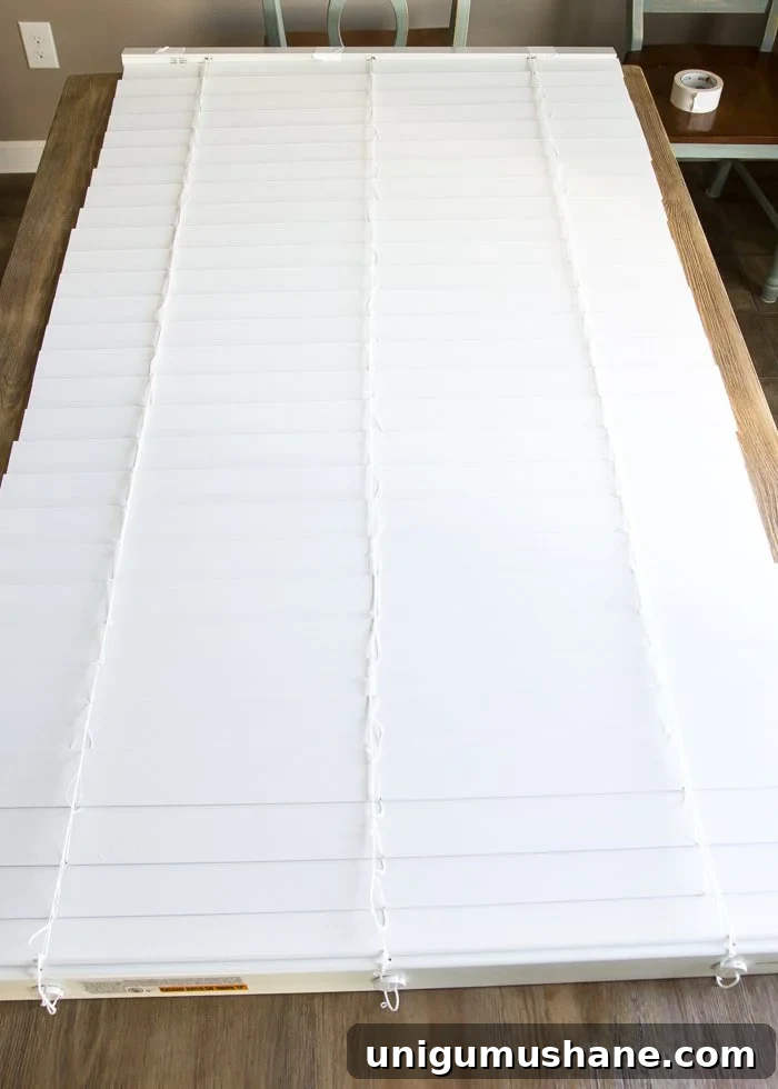 Turn Old Blinds into Burlap Roman Shades 4 DIY Burlap Roman Shades from Blinds | blesserhouse.com - A beautiful way to make pricey looking window shades for cheap!