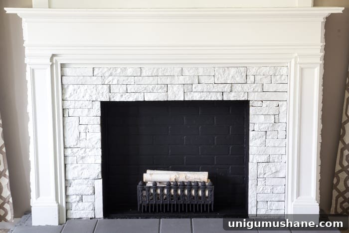 Modern DIY Faux Fireplace Makeover 11 DIY Faux Fireplace Updated | blesserhouse.com - This fireplace looks so real and it cost about $600 to build!