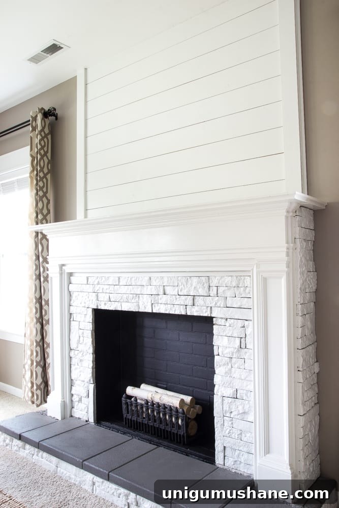 Modern DIY Faux Fireplace Makeover 12 DIY Faux Fireplace Updated | blesserhouse.com - This fireplace looks so real and it cost about $600 to build!